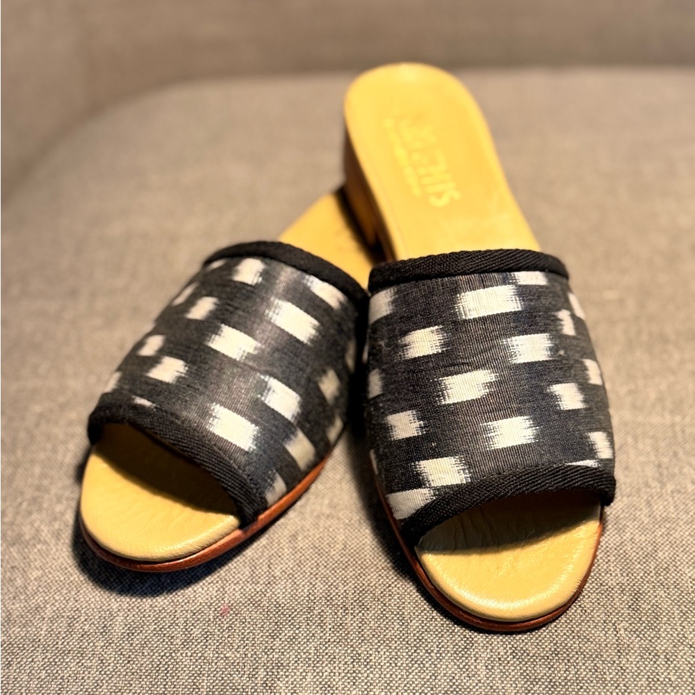 Artemis Design Co Black and White Mules with Bold Contrast